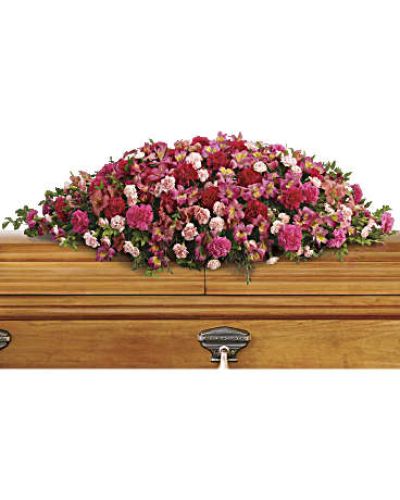 <div id="mark-1" class="m-pdp-tabs-marketing-description">

<hr />

A magnificent cascade of pink floral favorites accented with huckleberry conveys an outpouring of love and respect for one who has passed.

</div>
<div id="desc-1">
<ul>
 	<li>The sumptuous bouquet includes dark pink alstroemeria, hot pink carnations, pink carnations and miniature light pink carnations accented with huckleberry and eucalyptus.</li>
</ul>
</div>