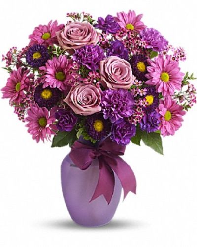<div class="m-pdp-tabs-description">
<div id="mark-1" class="m-pdp-tabs-marketing-description">Know someone you love to make laugh? Someone you love to laugh with? Someone who could use a laugh? Someone who fits all of the above? Well, this beautiful arrangement has charms that extend way beyond its blossoms.</div>
</div>
<p id="arrngDescp">Lavender roses and daisy spray chrysanthemums, purple carnations, miniature carnations, matsumoto asters and pink waxflower are delivered in a sweet lilac vase that's tied with a purple satin ribbon. Love, laugh and send it today!</p>