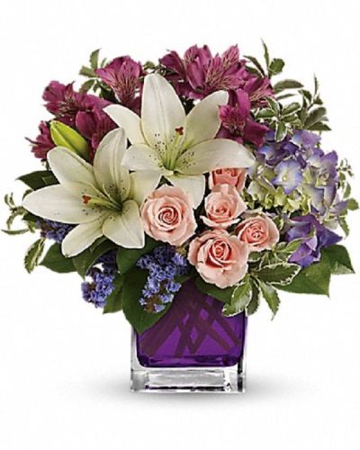 <div class="m-pdp-tabs-description">
<div id="mark-1" class="m-pdp-tabs-marketing-description">Hello, gorgeous! This lovely bouquet includes purple hydrangea, light pink spray roses and white asiatic lilies arranged in our vibrant violet glass cube.</div>
</div>
<p id="arrngDescp">Purple hydrangea, light pink spray roses, white asiatic lilies, dark pink alstroemeria and lavender sinuata statice are accented with assorted greens.</p>