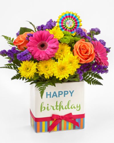 <div class="summary entry-summary">
<div class="woocommerce-product-details__short-description">

The FTD® Birthday Brights™ Bouquet is a true celebration of color and life to surprise and delight your special recipient on their big day! Hot pink gerbera daisies and take center stage surrounded by purple gilly flowers, yellow chrysanthemums, orange carnations, green button poms, bupleurum, and lush greens to create party perfect birthday display. Presented in a modern rectangular ceramic vase with colorful striping at the bottom, “Happy Birthday” lettering at the top, and a bright pink bow at the center, this unforgettable fresh flower arrangement is then accented with a striped happy birthday pick to create a fun and festive gift.

</div>
</div>
<div class="woocommerce-tabs wc-tabs-wrapper">

&nbsp;

</div>