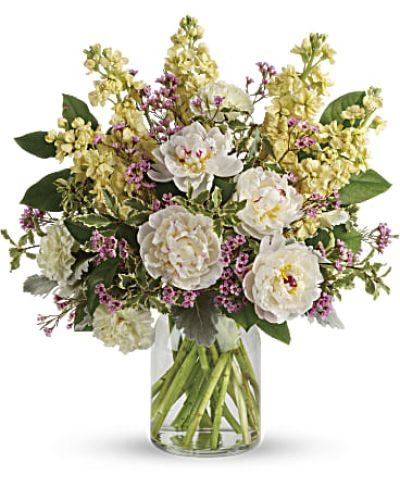 <div id="mark-3" class="m-pdp-tabs-marketing-description">Chic and serene, this dreamy bouquet of wondrous white peonies and creamy blooms in a milk jug vase sends your very best wishes for a stylish spring!</div>
&nbsp;
<div id="desc-3">
<ul>
 	<li>This serene arrangement features white peonies, light yellow carnations, light yellow stock, lavender waxflower, dusty miller, pitta negra, and lemon leaf.</li>
 	<li>Delivered in a clear glass vase.</li>
</ul>
</div>