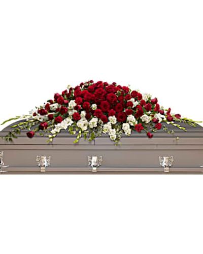 <div id="mark-1" class="m-pdp-tabs-marketing-description">A traditional tribute that communicates deep love and eternal commitment. This dramatic red and white casket spray is ideal for a full couch or closed casket, mixing dozens of deep red roses with the pure white beauty of gladioli and stock.</div>
<div id="desc-1">
<ul>
 	<li>Red roses and carnations are paired with snow white gladioli and stock, then accented with greens including variegated ivy and salal.</li>
</ul>
</div>