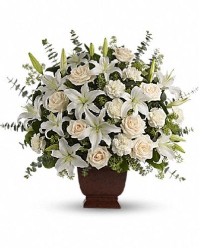 <div class="m-pdp-tabs-description">
<div id="mark-1" class="m-pdp-tabs-marketing-description">A simply beautiful way to show you care. By sending this elegant arrangement to the home of those in mourning, you are letting them know they are embraced in your thoughts. And in your heart.</div>
</div>
<p id="arrngDescp">Fresh flowers such as crème roses, white oriental lilies, carnations, eucalyptus and more designed to honor their memory lovingly.</p>