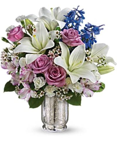 <div class="m-pdp-tabs-description">
<div id="mark-1" class="m-pdp-tabs-marketing-description">Make their dreams come true with this ethereal bouquet - beautiful snow-white lilies, lavender roses and a bright blue hint of delphinium create a dreamy declaration of your affection she'll never forget.</div>
</div>
<p id="arrngDescp">Lavender roses, white asiatic lilies, lavender alstroemeria, miniature white carnations, blue delphinium and white waxflower are arranged with fresh greens.</p>