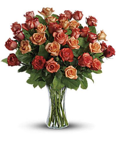 <div id="mark-2" class="m-pdp-tabs-marketing-description">The sun will come out tomorrow, and tomorrow, and tomorrow with this blazing bouquet of orange roses. Orange, light orange and dark orange - gorgeous roses delivered in a sparkling flared glass vase. No doubt about it, this is one hot gift.</div>
&nbsp;
<div id="desc-2">
<ul>
 	<li>This spectacular bouquet includes orange roses, light orange roses and dark oranges accented with salal.</li>
 	<li>Delivered in a flared glass vase.</li>
</ul>
</div>