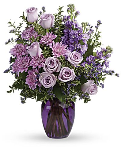 <hr />



<hr />

<div id="mark-3" class="m-pdp-tabs-marketing-description">The perfect pick for the purple lover in your life! This impressive bouquet charms with roses, stock and mums. Presented in a gorgeous glass vase.</div>
<div id="desc-3">
<ul>
 	<li>This dramatic arrangement includes lavender roses, lavender stock, lavender cushion spray chrysanthemums, lavender limonium, oregonia and lemon leaf</li>
</ul>
</div>
