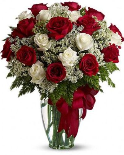 Roses - like love - are timeless. And, this stunning blend of red and white roses - accented with Queen Anne's Lace and adorned with a bold red ribbon - is a timeless gift for your true love.