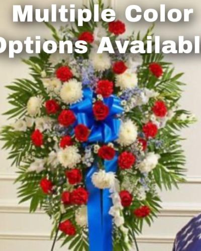 &nbsp;

<hr />

Honor a beloved veteran for their dedicated service with this heartfelt patriotic arrangement. Meticulously crafted by our expert florists using the freshest blooms, it perfectly conveys all the love, pride and sympathy you feel in your heart. This standing spray arrangement features fresh red, white and blue flowers such as roses, football mums, gladiolas, delphiniums, carnations and more. Appropriate for family, friends and business associates to send directly to the funeral home.
<h1>$<span style="color: #0000ff;">199.94</span></h1>

<hr />

<h1></h1>
