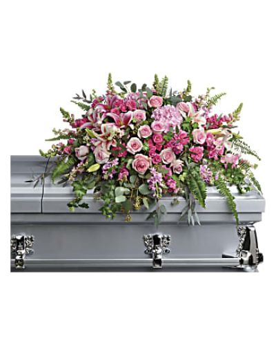 <div class="m-pdp-tabs-description">
<div id="mark-1" class="m-pdp-tabs-marketing-description">Like your beautiful memories, this dramatic spray of pink hydrangea, roses and lilies will take your breath away. A fresh, feminine symbol of hope for the service.</div>
</div>
<p id="arrngDescp">This dramatic spray features pink hydrangea, pink roses, pink spray roses, pink stargazer lilies, pink carnations, pink larkspur, pink snapdragons, pink stock, green ivy, sword fern, silver dollar eucalyptus, seeded eucalyptus, and lemon leaf.</p>