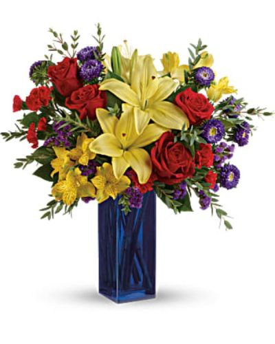 <div id="mark-3" class="m-pdp-tabs-marketing-description">Make their spirits fly with this bold bouquet! The colorful mix of red roses, yellow lilies and purple asters looks right at home in a cool, cobalt glass vase.</div>
<div id="desc-3">
<ul>
 	<li>This colorful arrangement includes red roses, yellow asiatic lilies, yellow alstroemeria, red miniature carnations, purple matsumoto asters, purple sinuata statice, parvifolia eucalyptus, and lemon leaf.</li>
</ul>
</div>