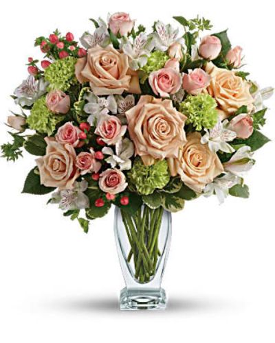 <div class="m-pdp-tabs-description">
<div id="mark-1" class="m-pdp-tabs-marketing-description">You'd do anything for them, so let them know how you feel by sending this generous and gorgeous arrangement. Who could ask for anything more?</div>
</div>
<p id="arrngDescp">Beautiful peach roses and spray roses, white alstroemeria, brilliant green carnations, peach hypericum and fresh garden greens are perfectly hand-arranged in a feminine Couture Vase.</p>