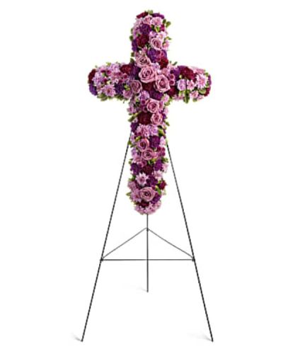 <div id="mark-1" class="m-pdp-tabs-marketing-description">A breathtaking standing cross of majestic purple and lavender blooms remembers and honors the departed with a meaningful and moving expression of faith, admiration and divine love.</div>
<div id="desc-1">
<ul>
 	<li>Gorgeous blooms such as lavender roses and carnations, and chrysanthemums of lavender and deep purple create a religious display ideal for a funeral or memorial service.</li>
</ul>
</div>