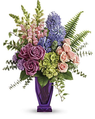 <div id="mark-3" class="m-pdp-tabs-marketing-description">Impressionist inspired, this painterly bouquet of green hydrangea, pink roses and lavender hyacinth is an elegant spring surprise. Your lucky someone will adore the keepsake couture vase!</div>
<div id="desc-3">
<ul>
<li>Green hydrangea, lavender roses, pink spray roses, lavender carnations, pink snapdragons and lavender hyacinth are arranged with sword fern, variegated ivy, spiral eucalyptus, and lemon leaf.</li>
</ul>
</div>