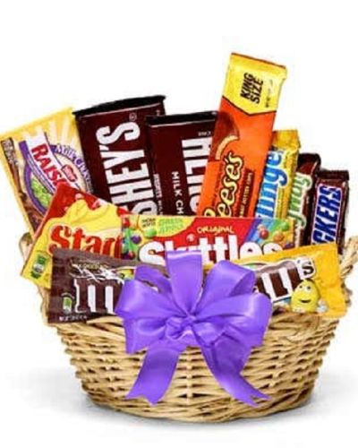 Show someone your sweet side with this incredible treat basket. With something for everyone, this classic collection of candy is sure to satisfy any sweet tooth and delight recipients of all ages. Please note, the bow and candy assortment may vary depending on local availability.