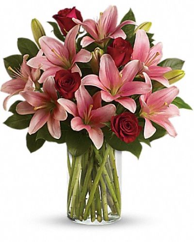 <div class="m-pdp-tabs-description">
<div id="mark-1" class="m-pdp-tabs-marketing-description">Turn an ordinary day into an enchanting daydream by sending her this magical bouquet! This stunning bouquet of rich red roses and magnificent pink lilies pampers her senses, refreshes her spirit and shows her how much you really care.</div>
</div>
<p id="arrngDescp">Includes red roses, pink lilies and fresh lemon leaves.</p>
