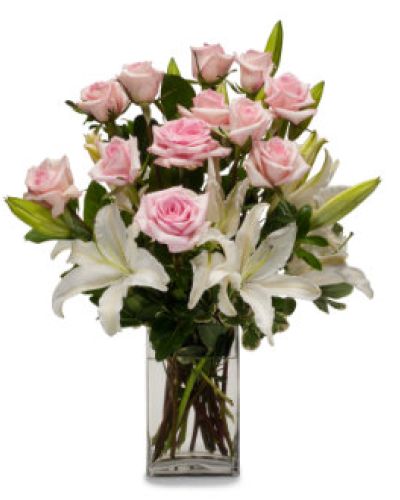Send hugs and kisses with this gorgeous arrangement of white lilies and pink roses.