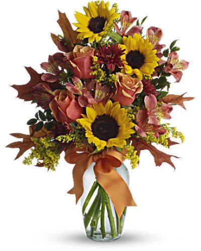 <div id="mark-1" class="m-pdp-tabs-marketing-description">This ravishingly rustic bouquet is like a burst of country charm. Complementing the sunny sunflowers are orange bi-color roses and orange and rust chrysanthemums - all delightfully tied up with a bright orange ribbon. Absolutely irresistible.</div>
&nbsp;
<div id="desc-1">The cheerful arrangement includes orange bi-color roses, yellow sunflowers, dark orange alstroemeria and rust cushion spray chrysanthemums accented with orange ribbon and assorted greenery.</div>